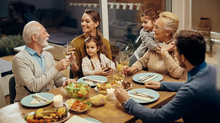 Family sharing dinner together — family therapy in Northern Virginia