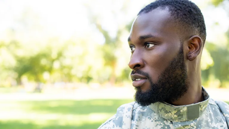 Veteran in a quiet, thoughtful moment — trauma and PTSD therapy in Northern Virginia