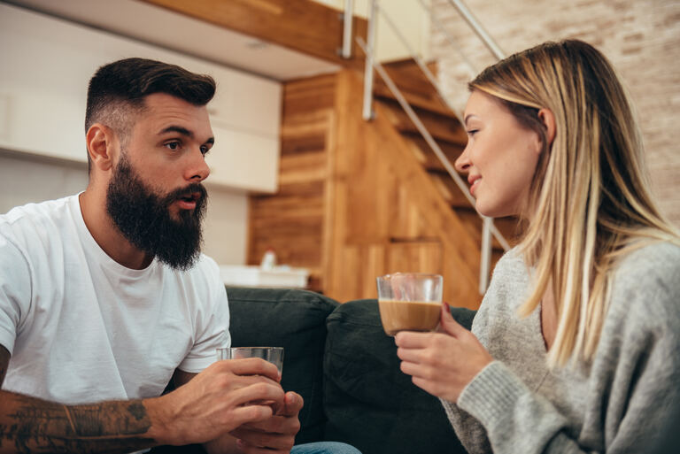 Couple reconnecting in an honest conversation at home