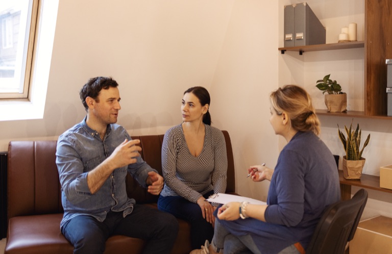 Couple reconnecting during a counseling session